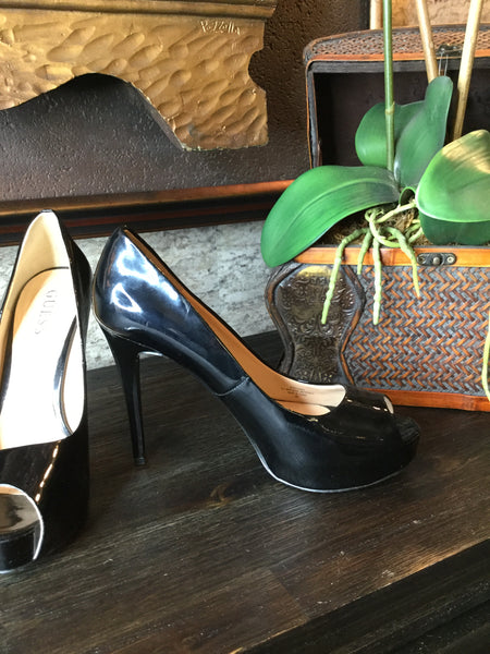 Black patent leather peep toe heels