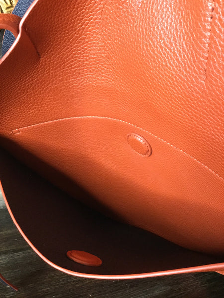 REMI/RIED rustic circle v leather handbag