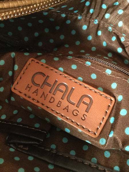 Chala brown leather paw print handbag