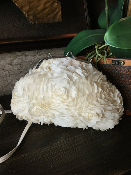 Claires cream fabric floral handbag