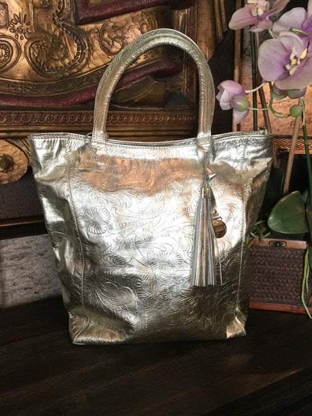 Boots N Bags gold metallic embossed handbag