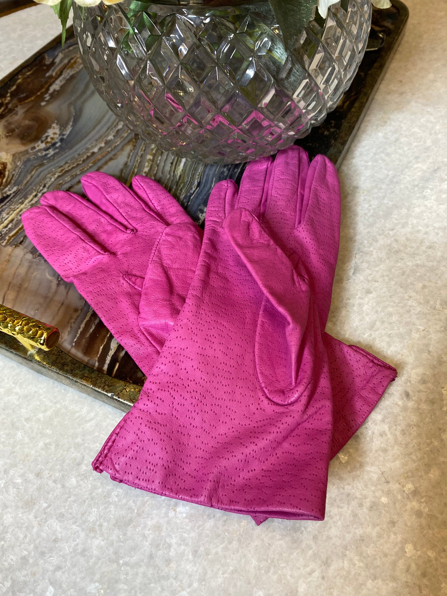 pink laser cut leather gloves