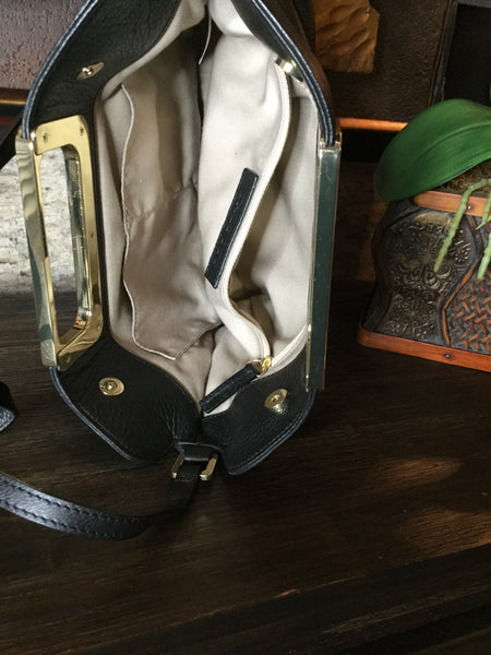 Black leather metal handle handbag