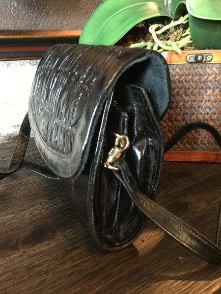 Black hard shell eel skin handbag