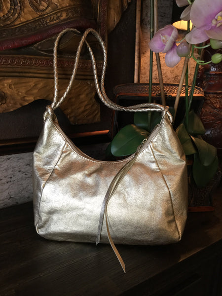 Gold metallic leather handbag
