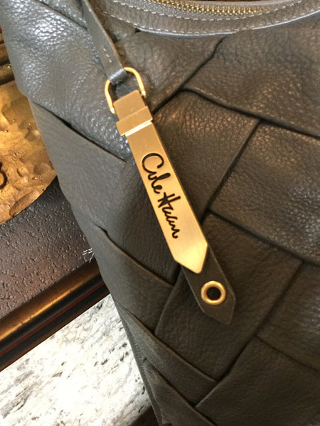 Gray woven leather handbag