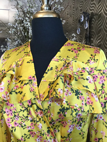 Yellow floral print wrap tie-front ruffle top