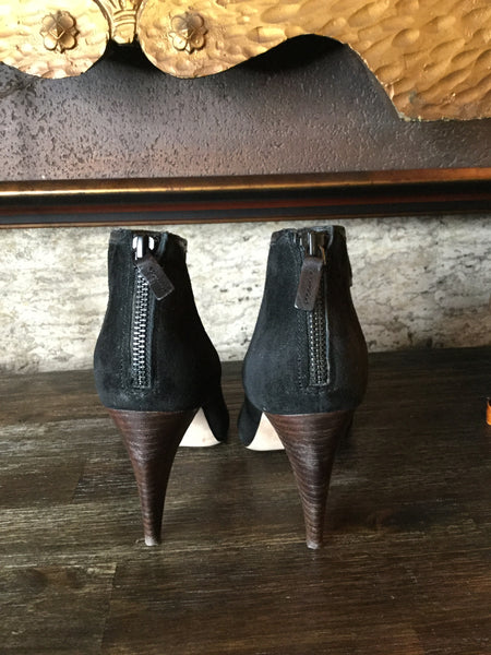 Black suede laser cutout heels bootie