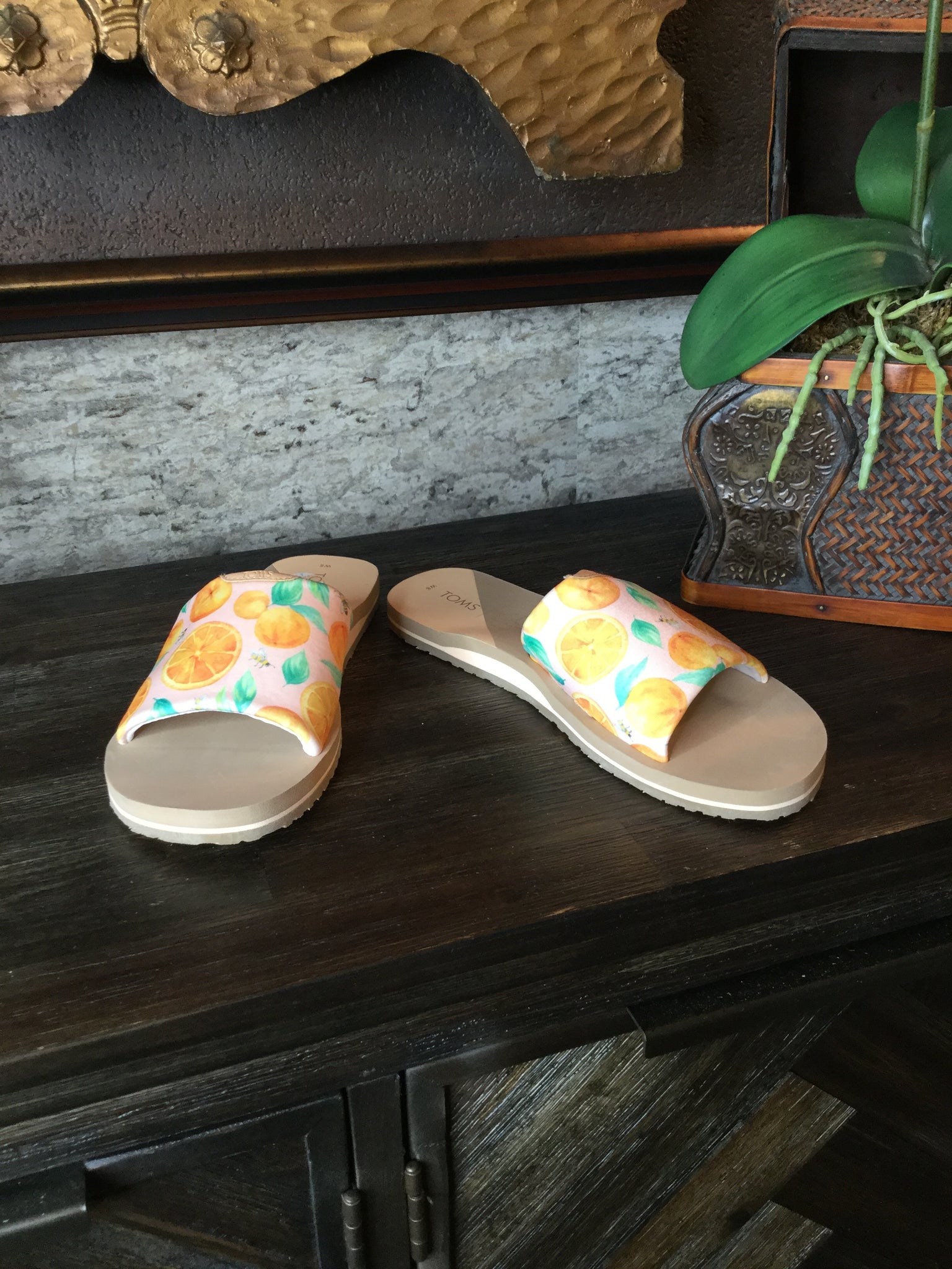 orange print slide in sandals