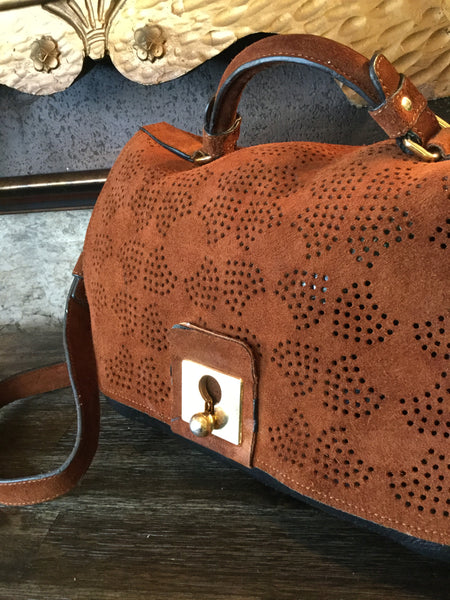 Suede leather sixties stem laser cut handbags