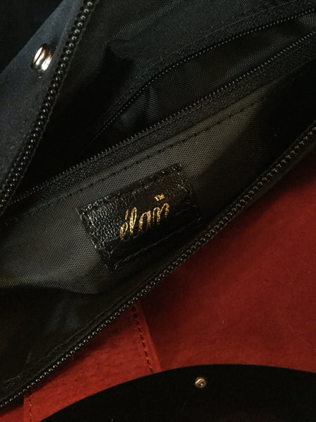 Vintage black leather suede red lining handbag